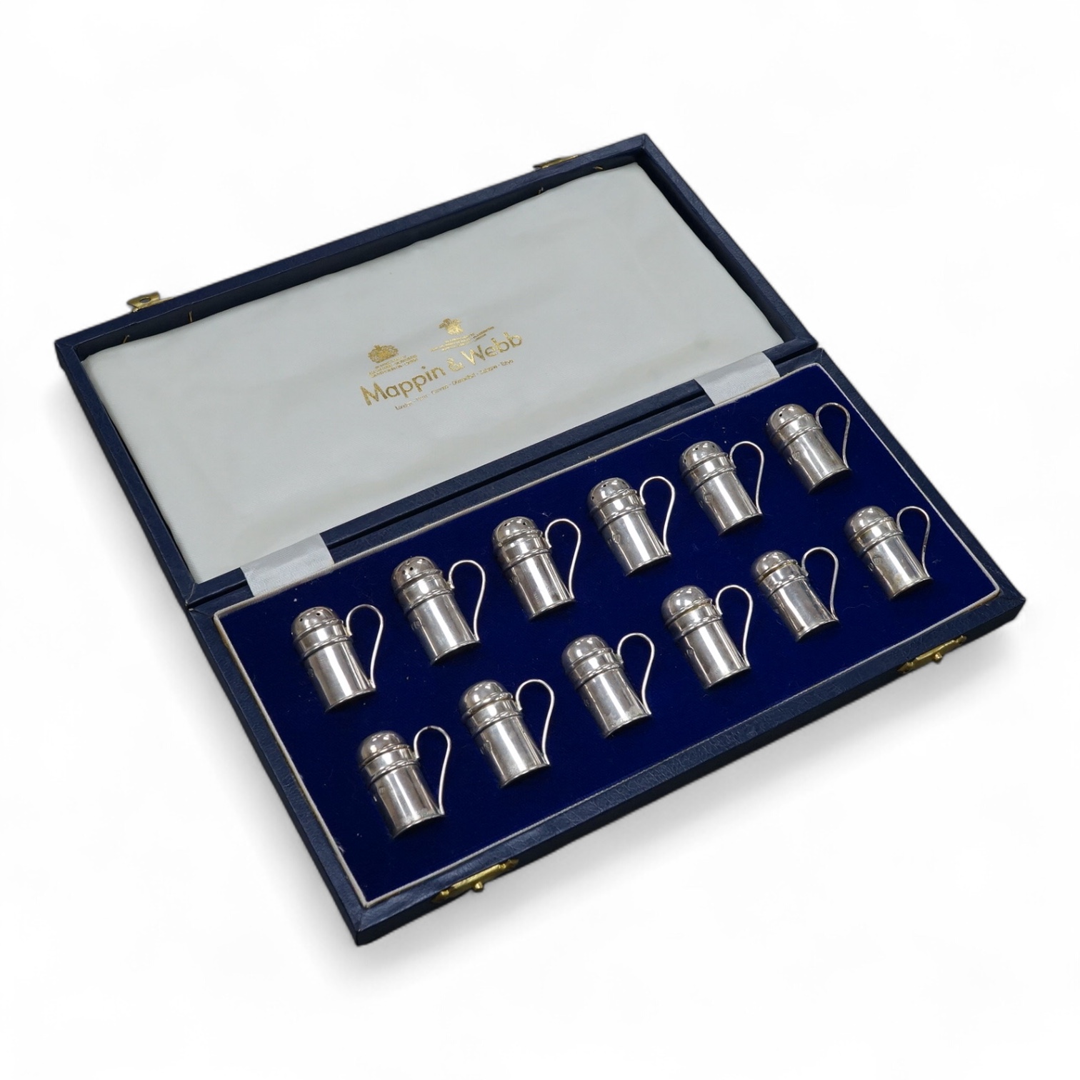 A modern cased set of twelve Mappin & Webb silver single handled condiments, J A Campbell London, 1986, 30mm.